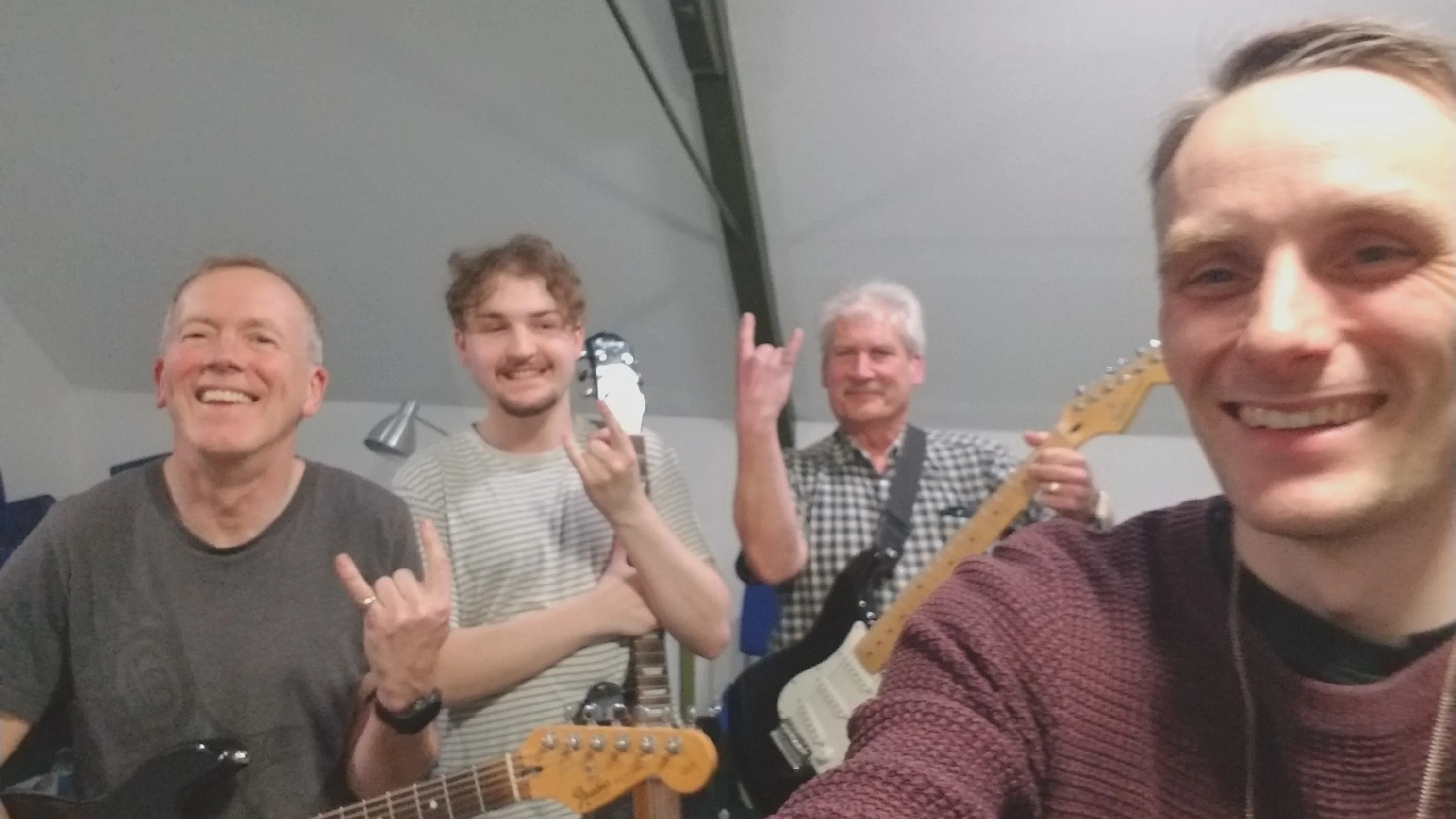 Aaron teaching group guitar lesson